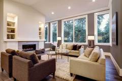 Chic light living room design with dark floors.